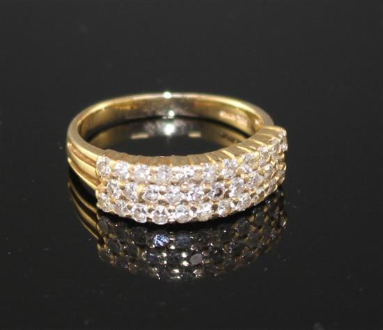 A modern 14k yellow metal and three row diamond set half hoop ring, size O, gross weight 4.3 grams.